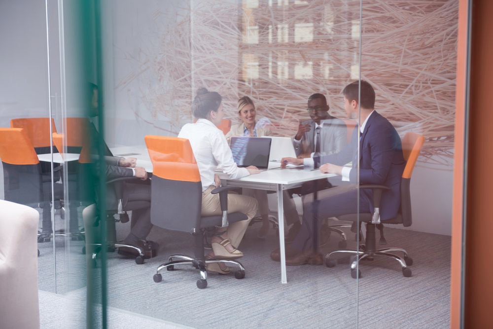 young business people group have meeting and working in modern bright office indoor